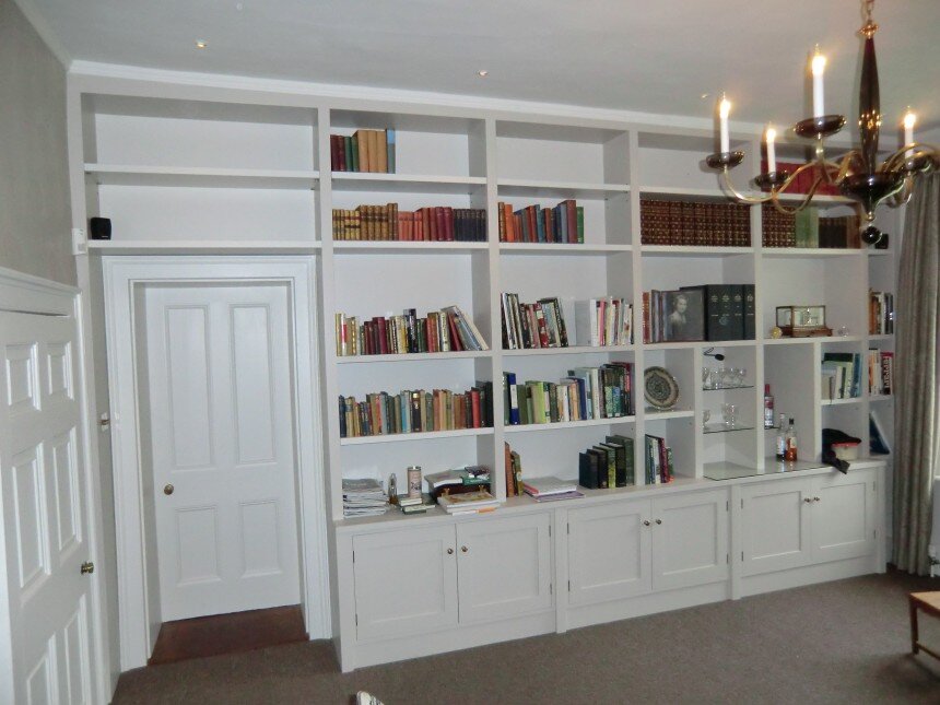 Copy of  Painted book case and cupboards fitted floor to ceiling