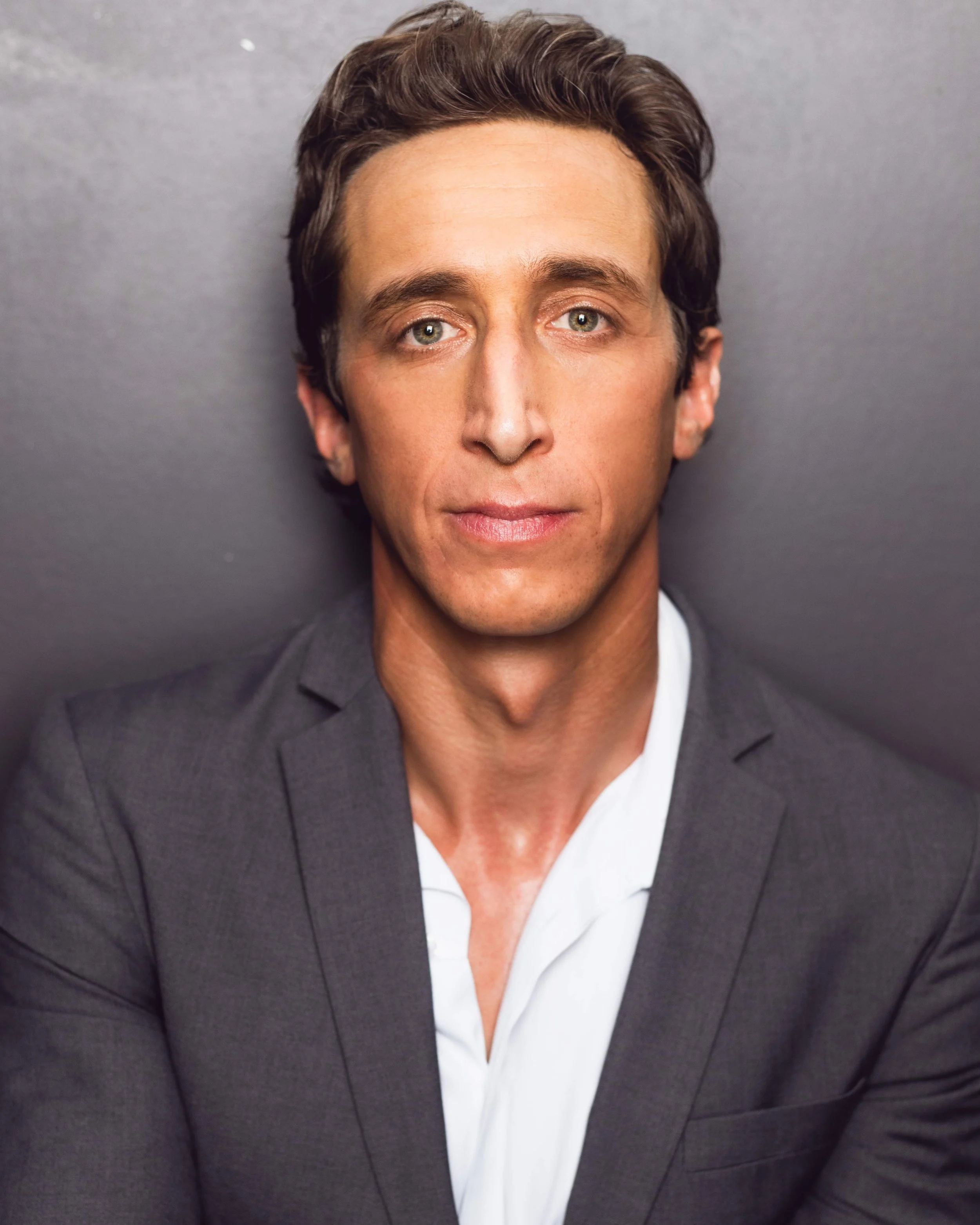 Suit Chatmon Headshot 8x10 crop just above hands - not as tight as could be - Summer 2025.jpg