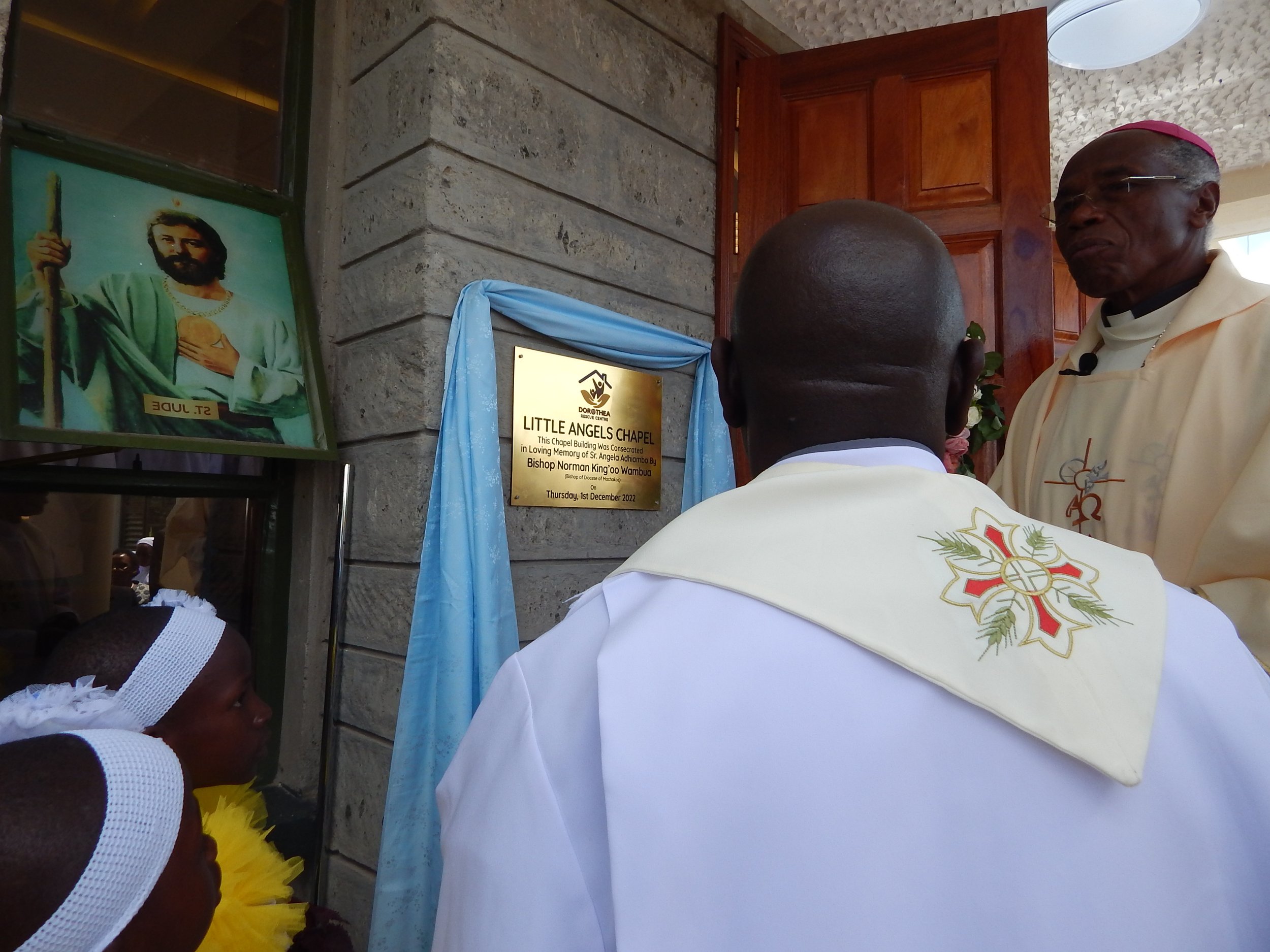 Bishop at front door blessing
