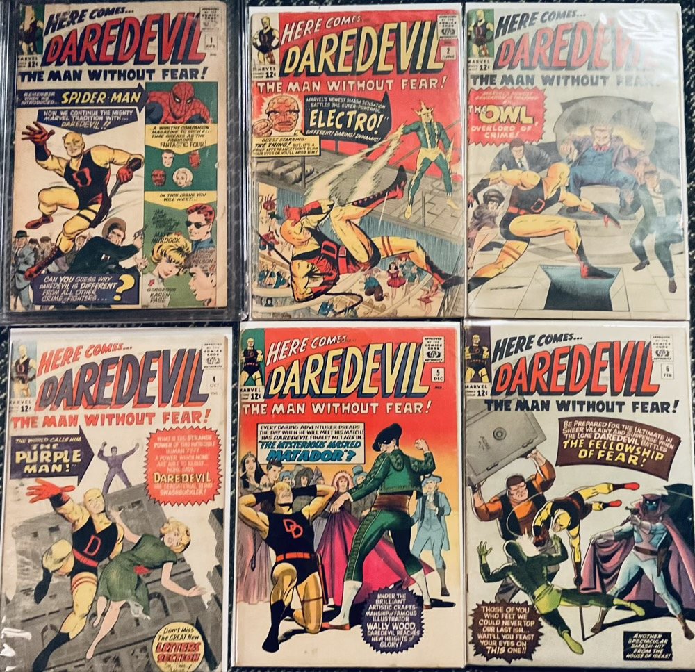 A grid of six comic books, Daredevil 1-6, 1964-65. Yellow suit swashbuckling in all.