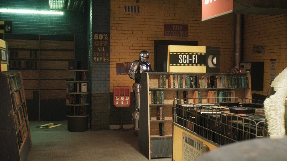Robocop and Pickles pick out a video
