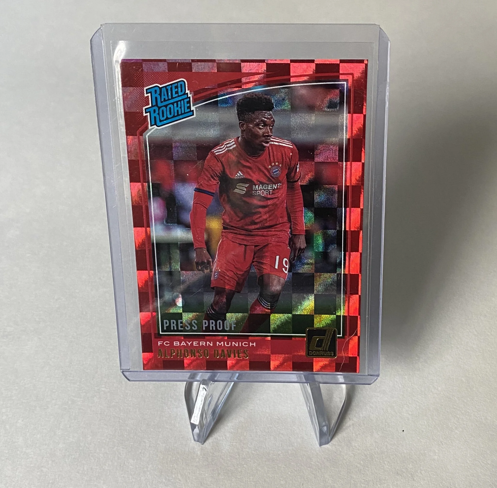 Alphonso Davies press proof rookie rated donruss card.JPG