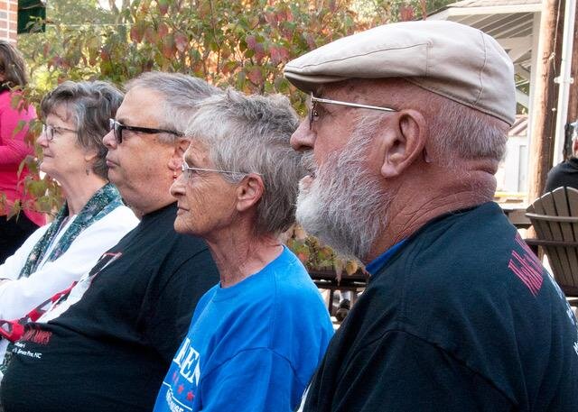 5 of 10 Risa, Howard, Pat, and John listening to the opening program.