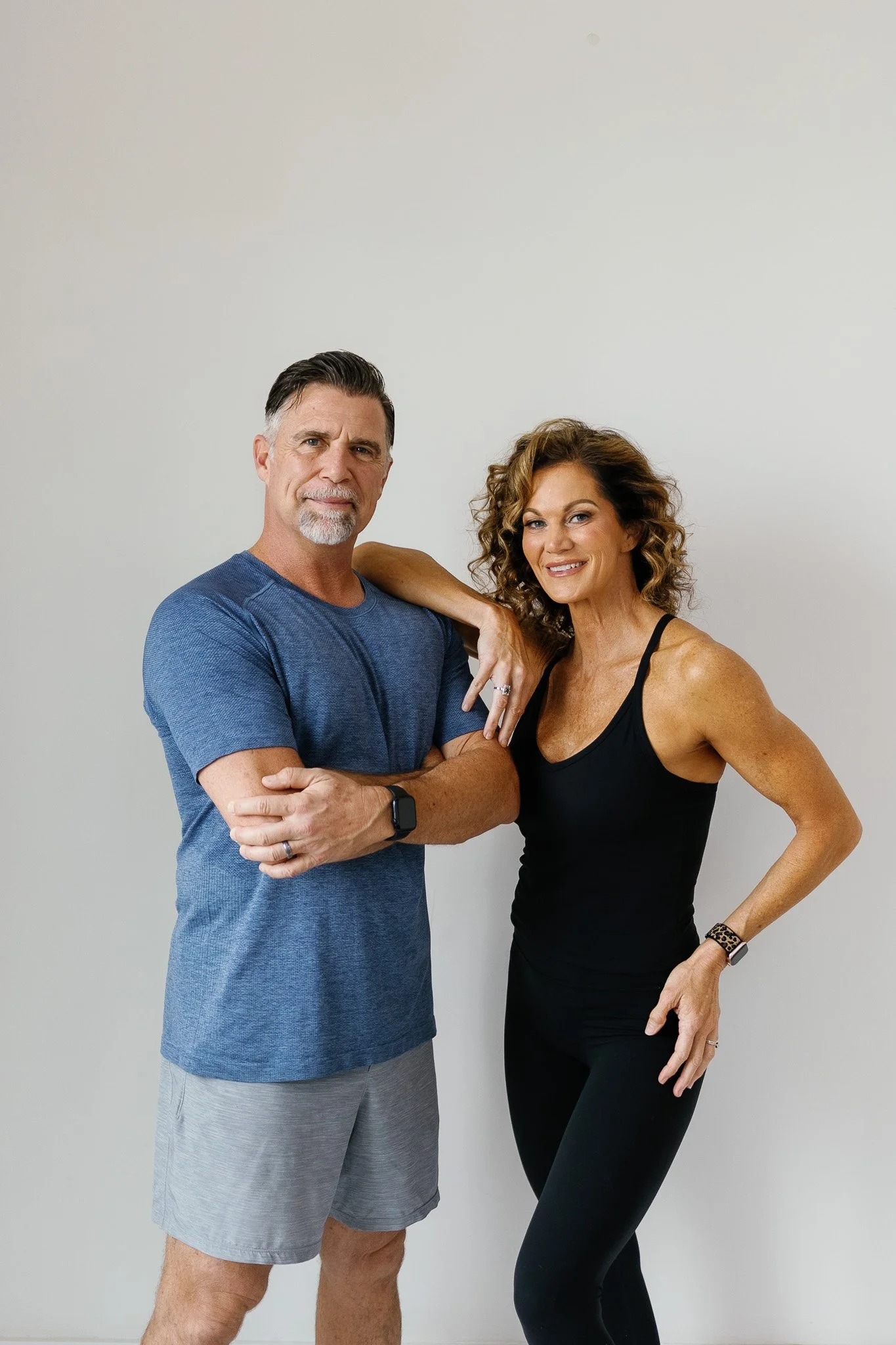 Online strength coaches Kerry and Chan Gannaway standing together