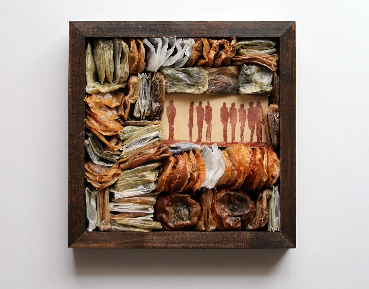 Archived Memory #09 12”x12”x2” - 30.4x30.4x5 cm, tea-bags, etching print and beeswax medium in wooden frame.