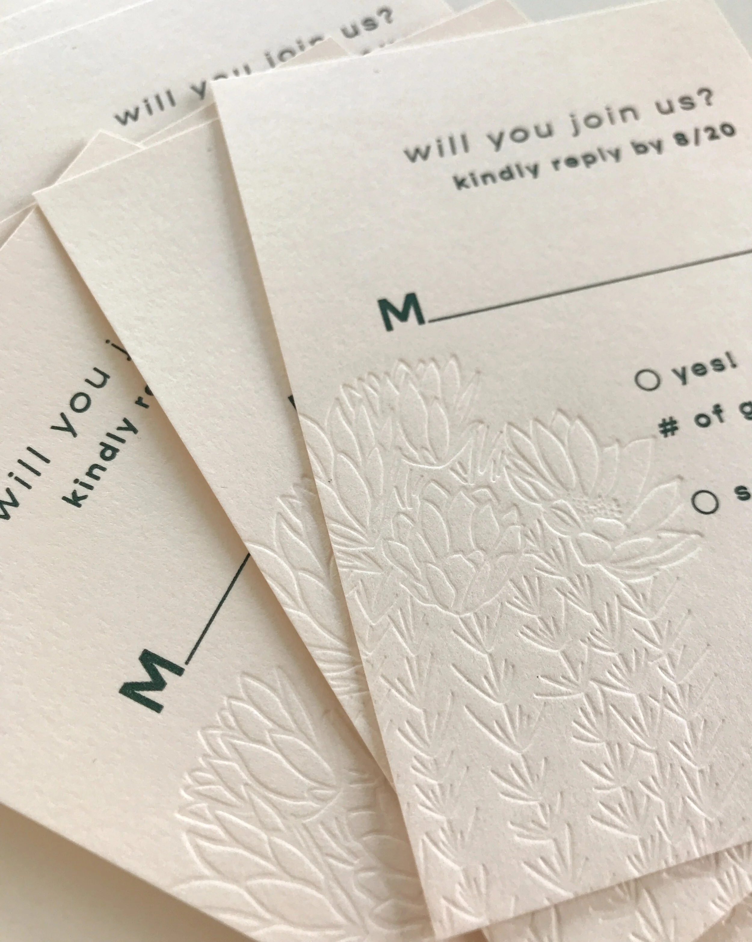 stack of letterpress reply cards