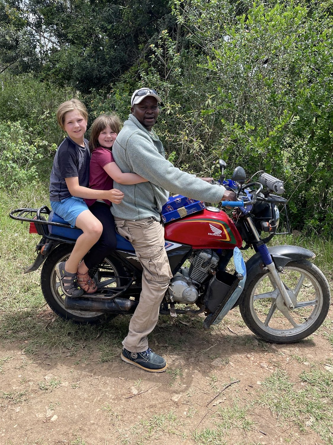 Willa and Lex ride a BodaBoda