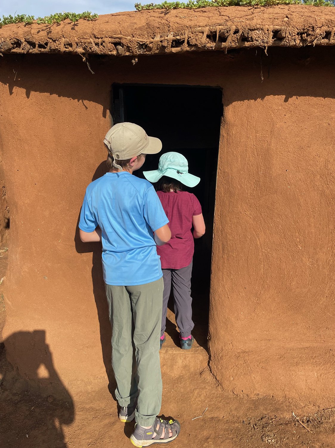 Touring a Masai dwelling
