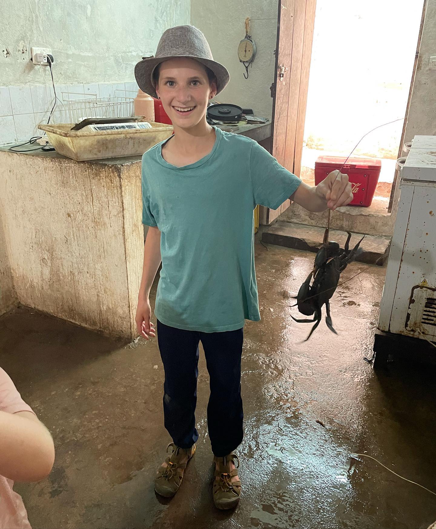 Jasper holds a crab