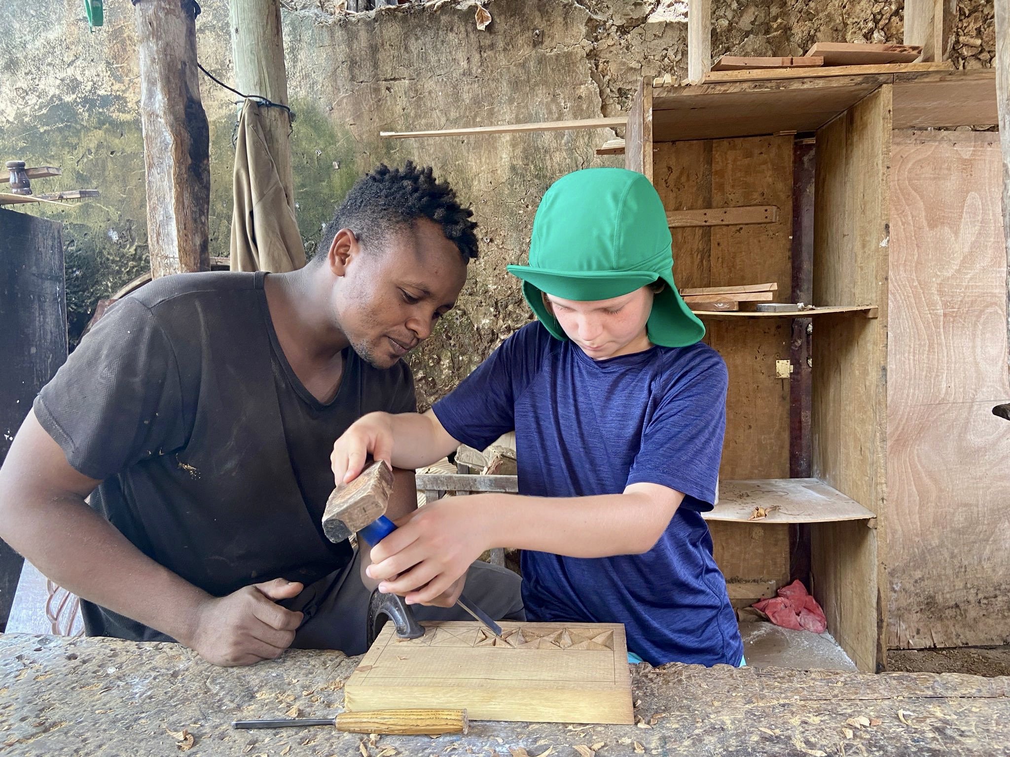 a traditional woodcarving lesson in Lamu Town