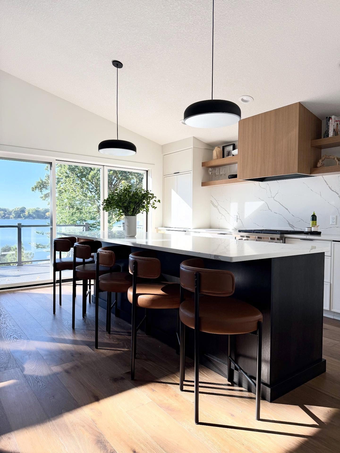 We doubled the size of this kitchen by letting go of the traditional dining space.  The Long Island is where everyone ends up anyway!