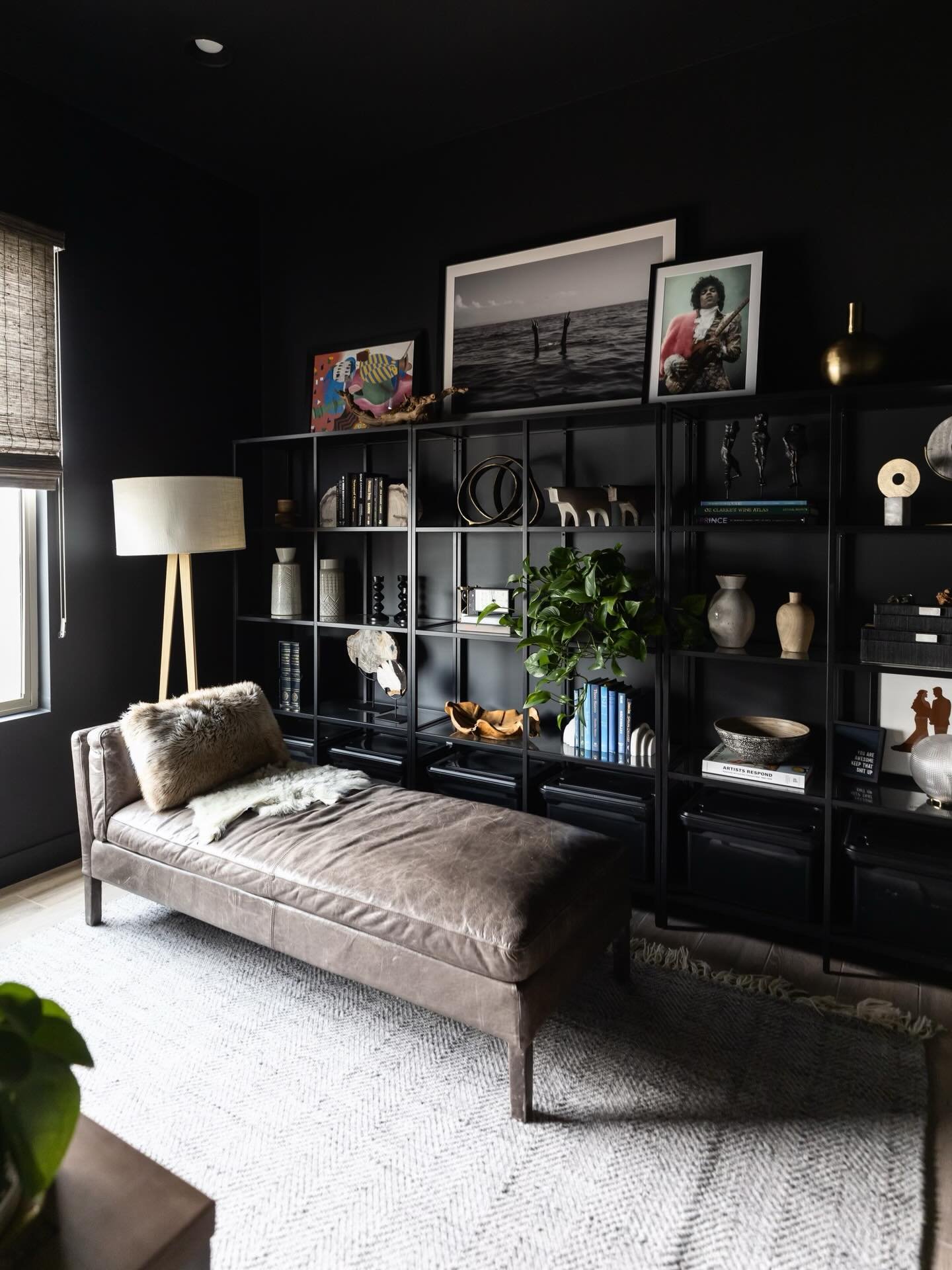 Color-drenched walls and ceiling, curated with personal art create a space that&rsquo;s both grounding and inspiring.