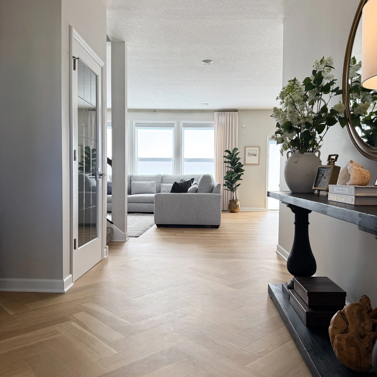 The goal for this project was to make the main level more functional for a young family&mdash;and warmer, more inviting and elevated.

As we explored the possibilities, it became clear that no amount of new furnishings, d&eacute;cor or art would crea