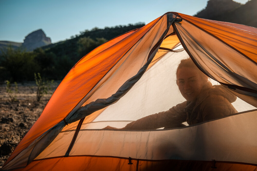 Bikepacking Baja Divide Mexico Desert Girl in Tent Golden Light