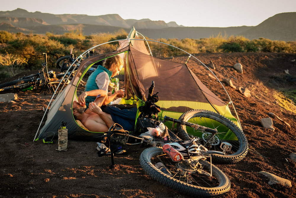 Bikepacking Baja Divide Mexico Couple in Tent Camping Golden Light