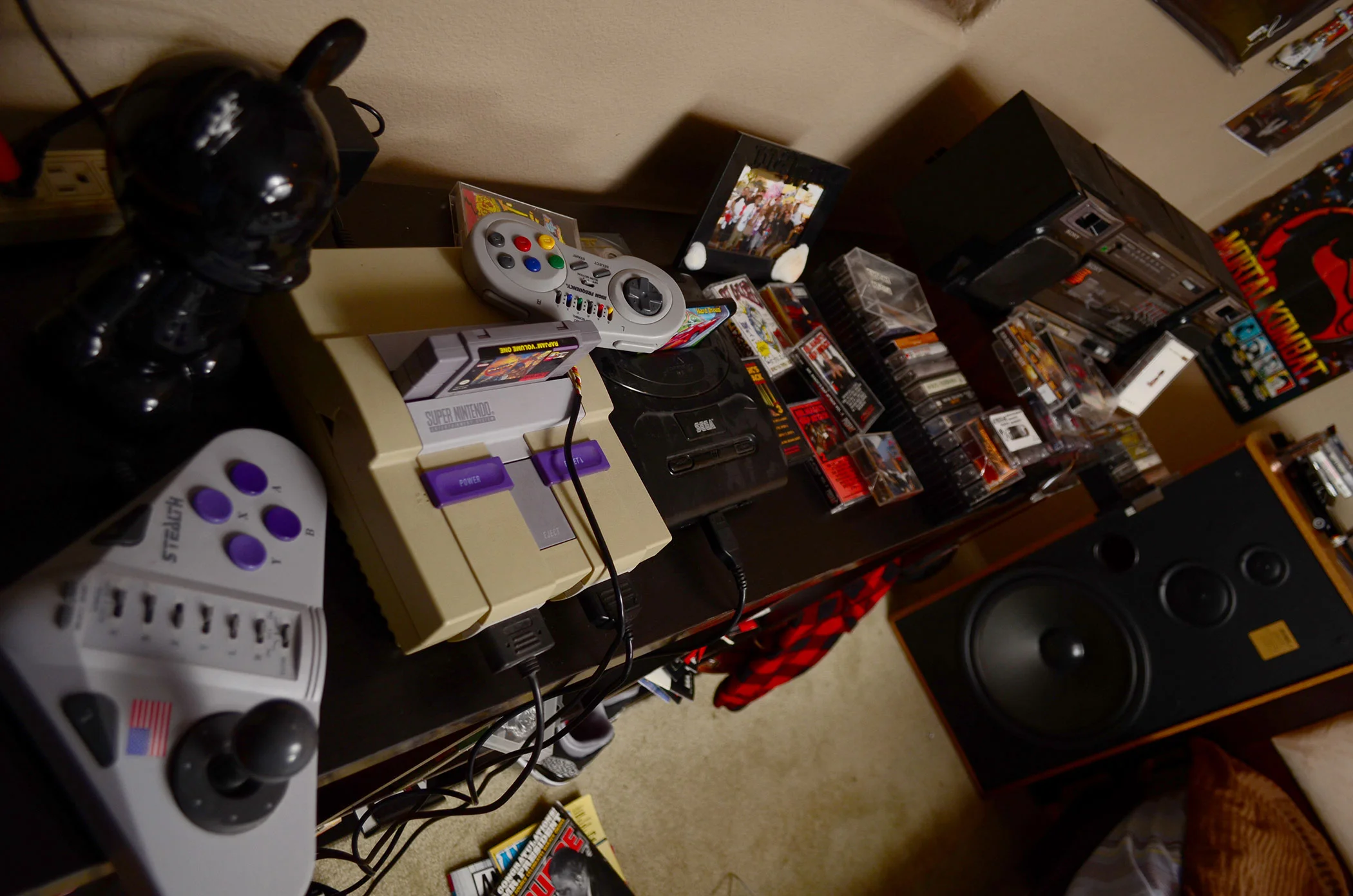 "Super Nintendo, Sega Genesis". For our shoot, "Rap Jam: Volume One" for the Super Nintendo plays on the television. The game featured rap and Hip-Hop artists playing street basketball.