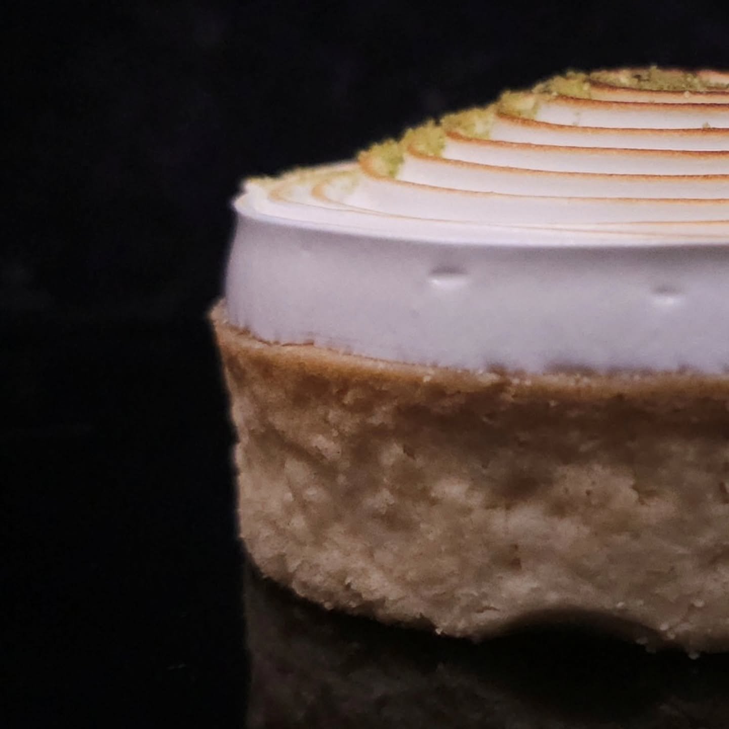 This lemon &amp; basil tart, new in the case, is incredibly delicious. Lemon basil curd and light as air toasted meringue in a sable' pastry shell finished with crystallized basil sugar. 
Come through and see us!