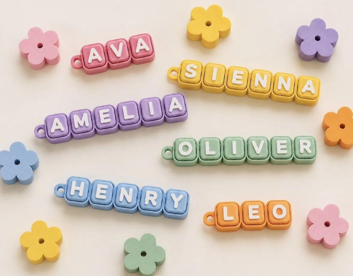 Personalised 3D printed name keyboard clicker keyrings in pastel colours