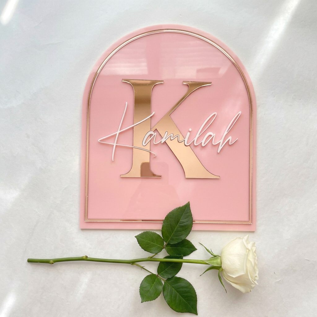 Custom three-colour acrylic baby name display for nursery decor