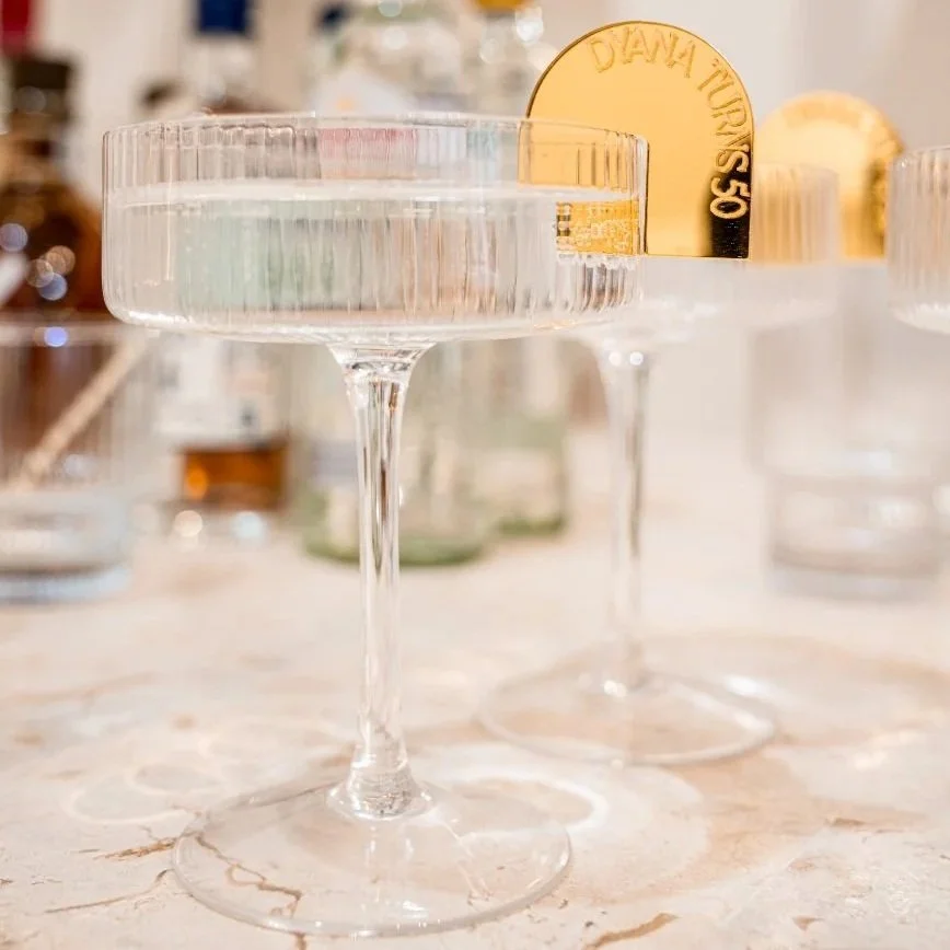 Personalised arch-shaped acrylic drink tags in a choice of colours