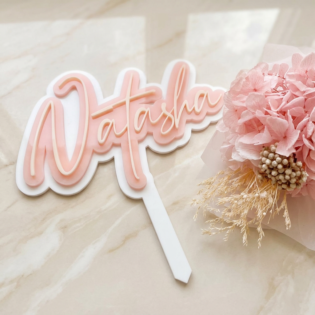 Custom acrylic cake topper featuring a two-tone layered design