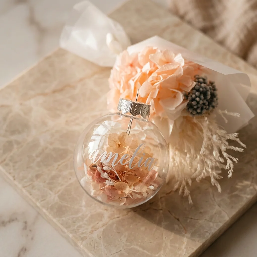 Preserved floral Christmas baubles showing different flower and colour combinations.