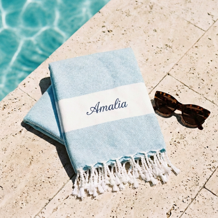 Personalised Turkish cotton beach towel with matching embroidered text