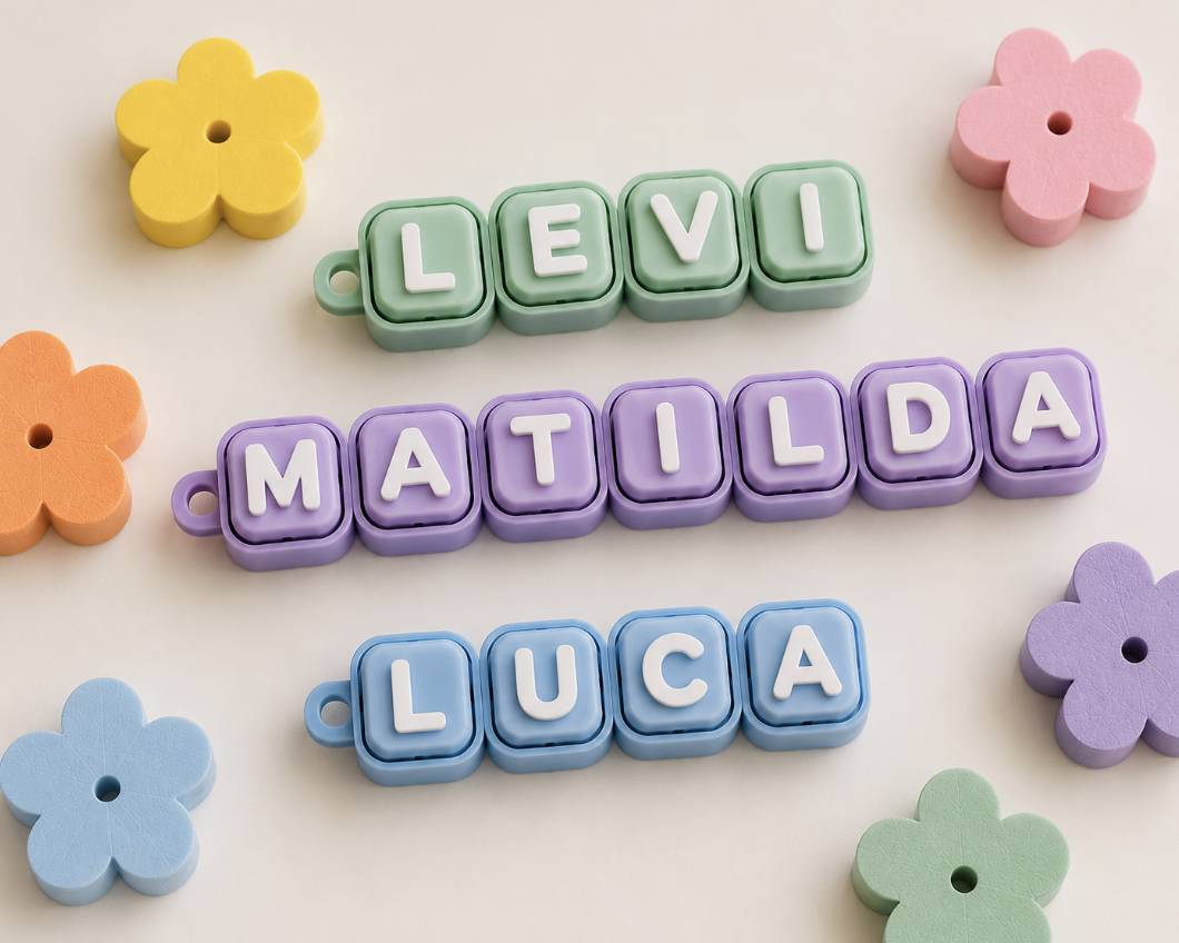 Personalised 3D printed name keyboard clicker keyrings in pastel colours