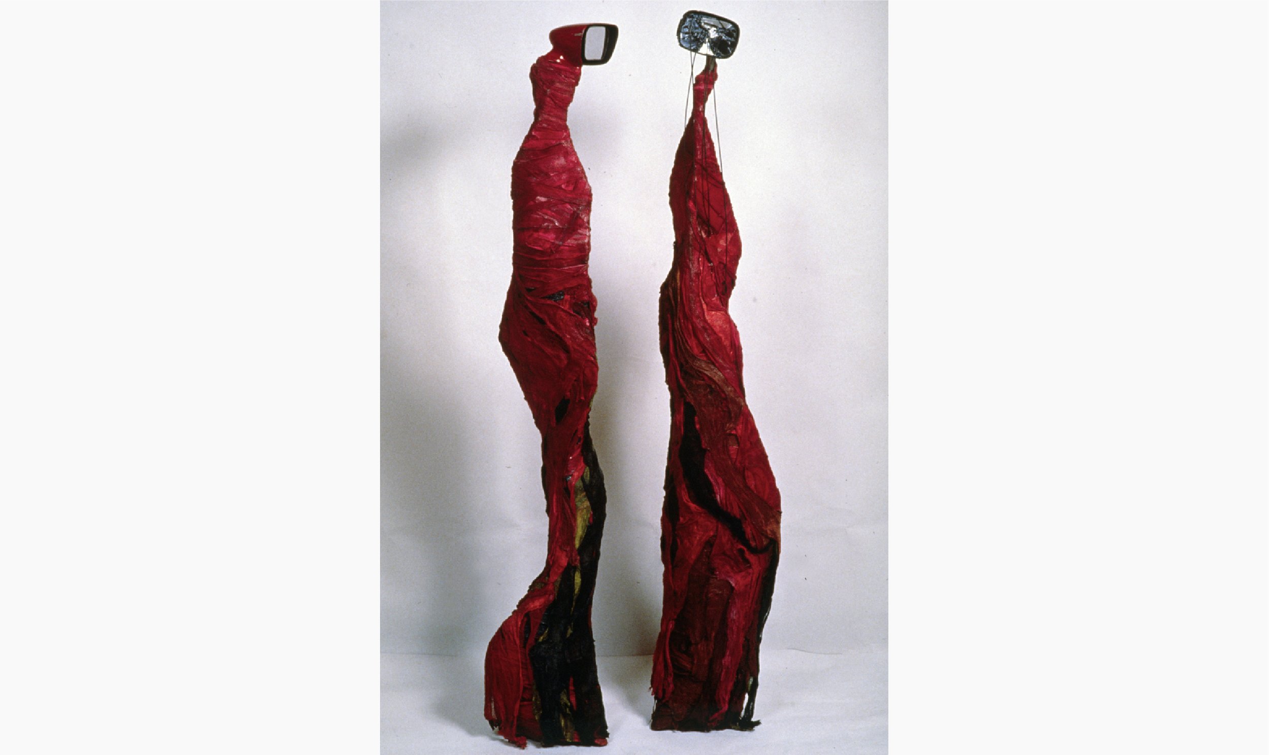  Welded steel frame covered in red dyed fabric dipped in glue, car mirrors 