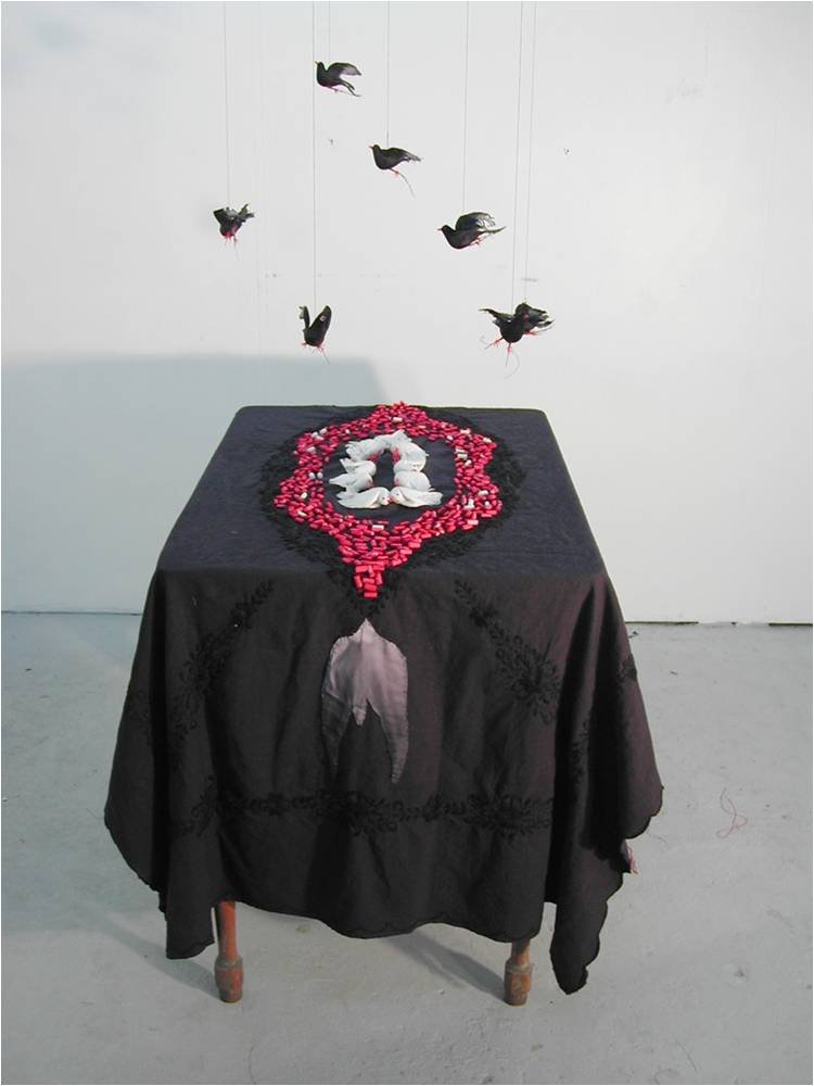black tablecloth with birds.jpg