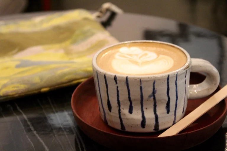 A But First Cappuccino and Liz' SROU pouch. Liz uses the pouch as a clutch as well as a carry all for notebooks and pens