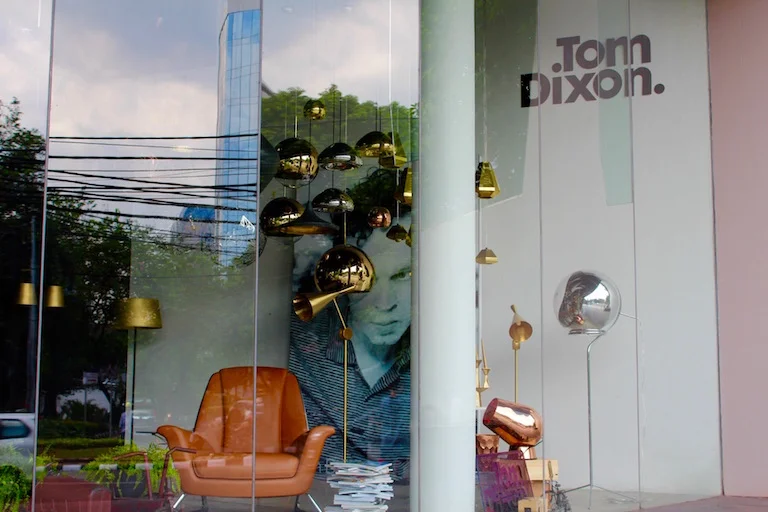 The expansive windows of Ambiente, allowing you to browse and admire the stunning pieces within. Our pick bottom right, the Tom Dixon copper ice bucket and candle stick