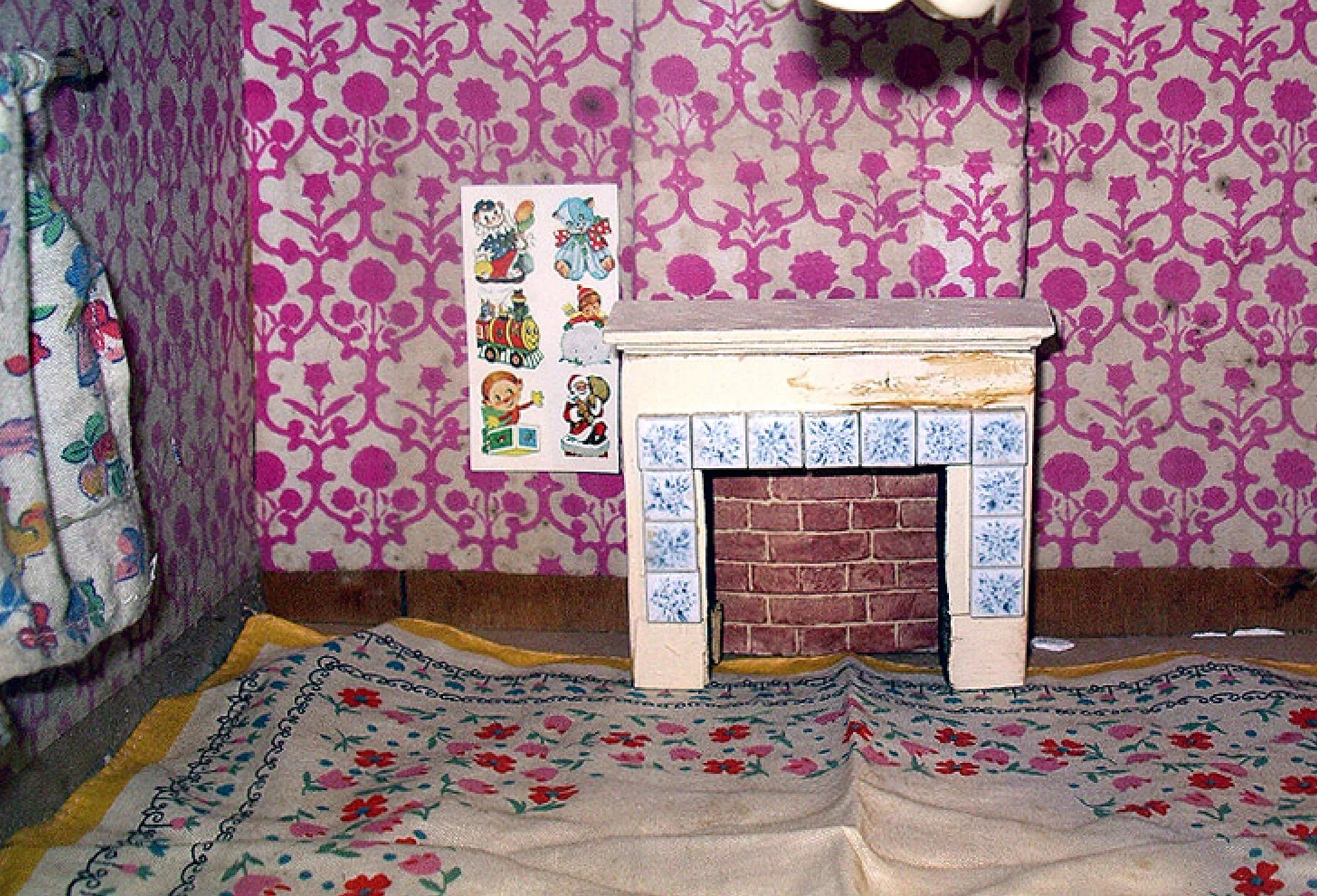 The dollshouse is rather forlorn looking now, having spent some thirty years in an attic.