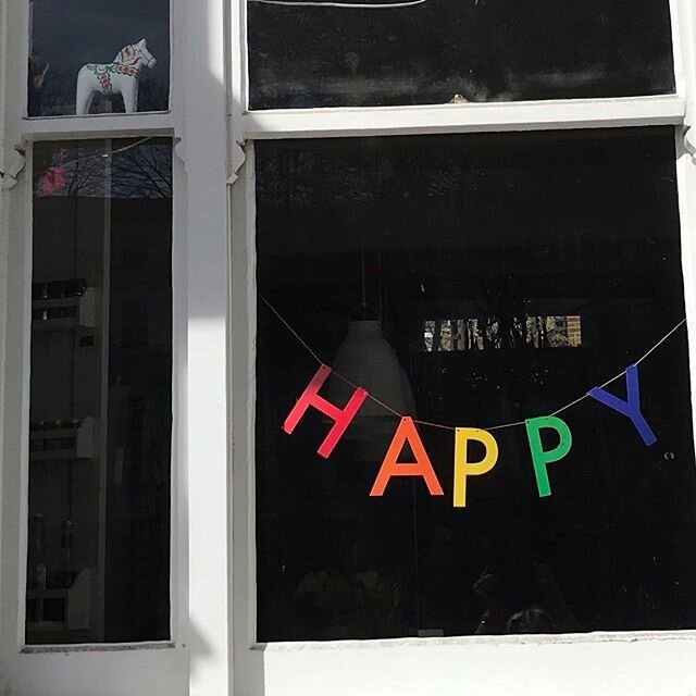 Left over birthday decorations...bi.r..t.h..d.a..y slowly slipped down the window
