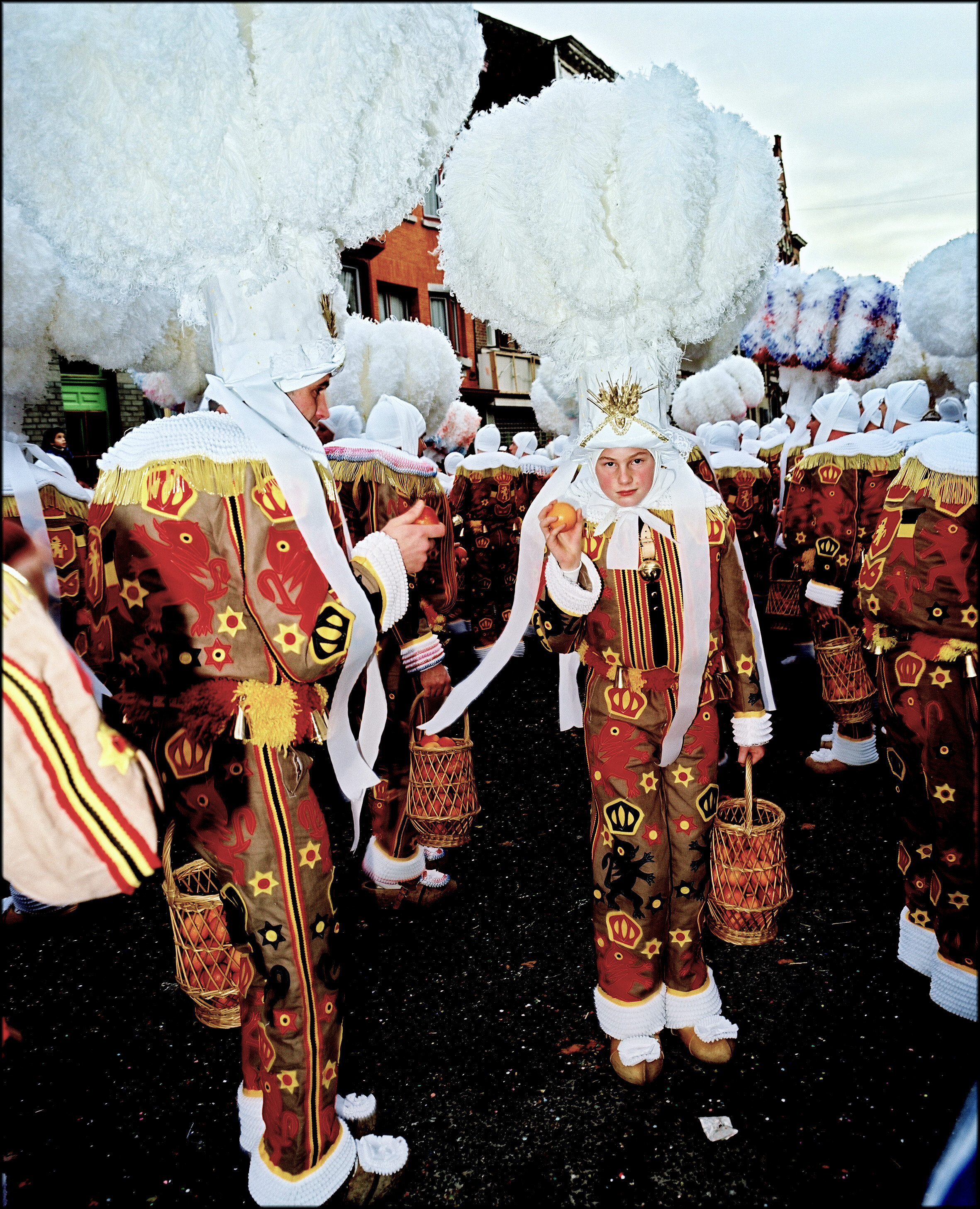  Young Gille holding an orange, the history of this carnaval is a mockery of the Netherlands under the Spanish rule 