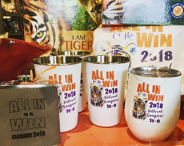 NEW Clemson National Champ items are in  stock! Flasks, pint glasses and  wine tumblers with lid! And we have restocked the 2018 and 2016 natty champ kitchen towels! You can find the same items in our Spartanburg store, @oliveandthensome. #clemsontig
