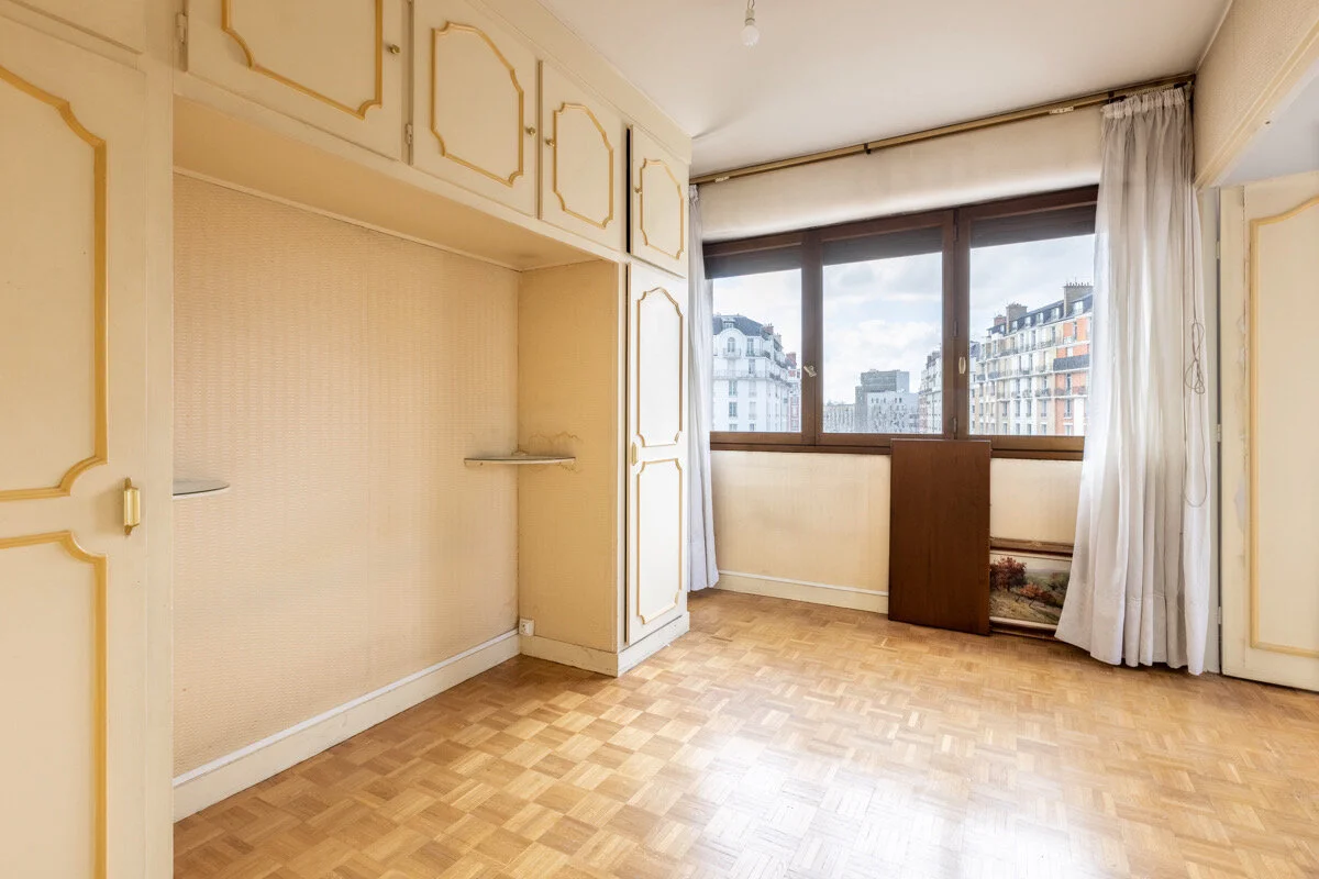 Before - A typical 1960's bedroom with upholstered walls in Paris 17 
