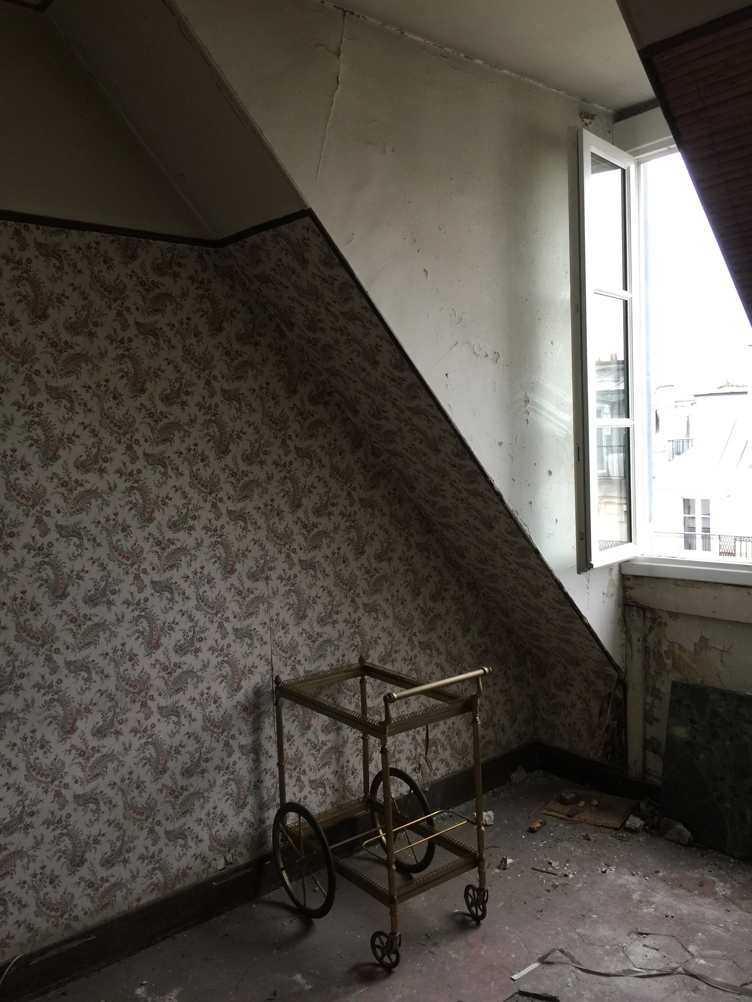 Before - Lost space under the roofs of a typical building in Paris 1 