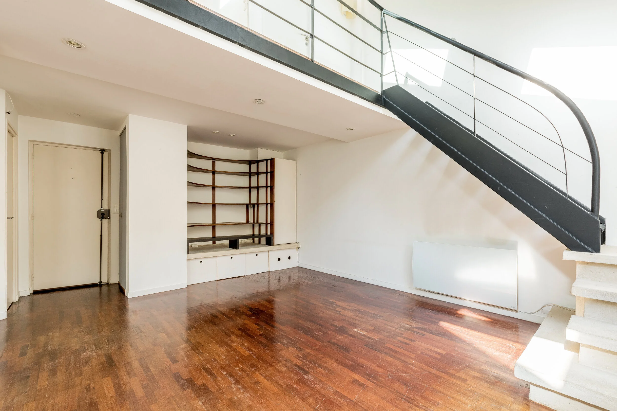 Before - An empty space under the staircase in Paris 12