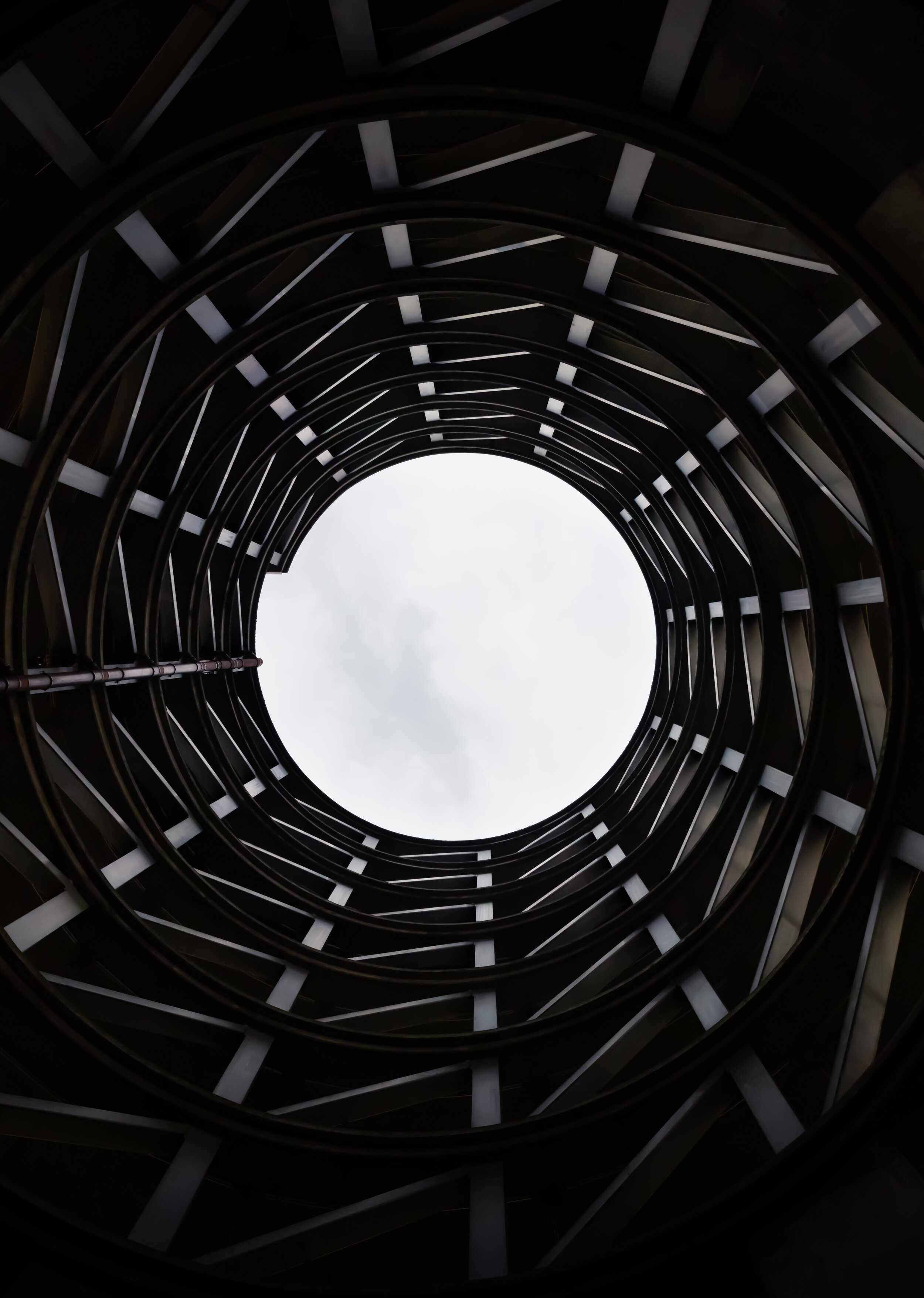 view looking up through a cylindrical building