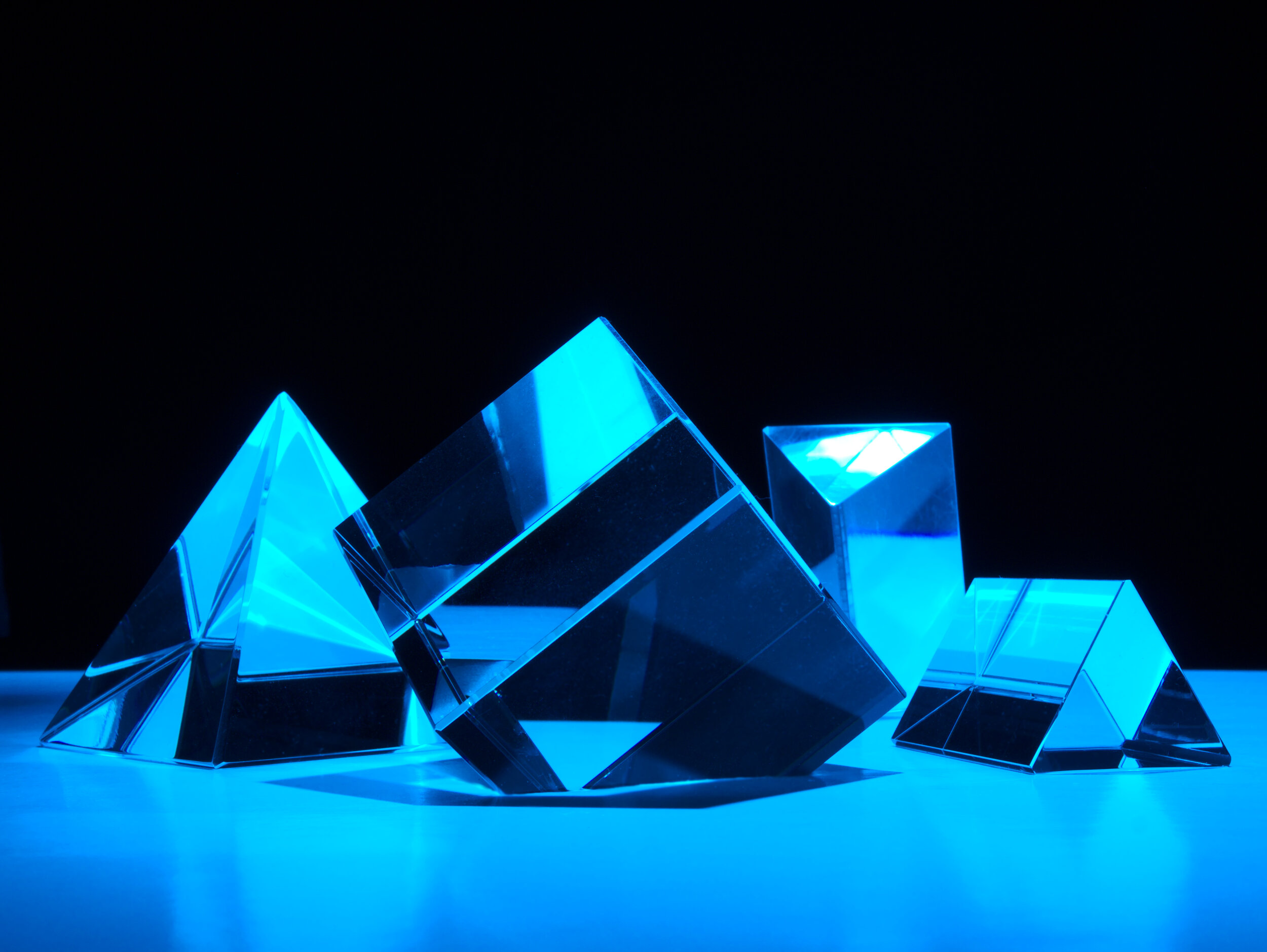 different shape cubes with a blue light