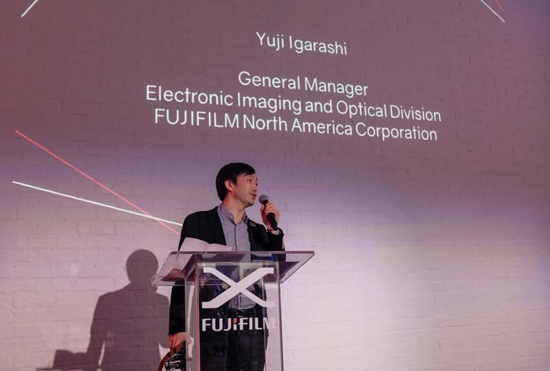 Fujfilm General Manager at podium giving speech