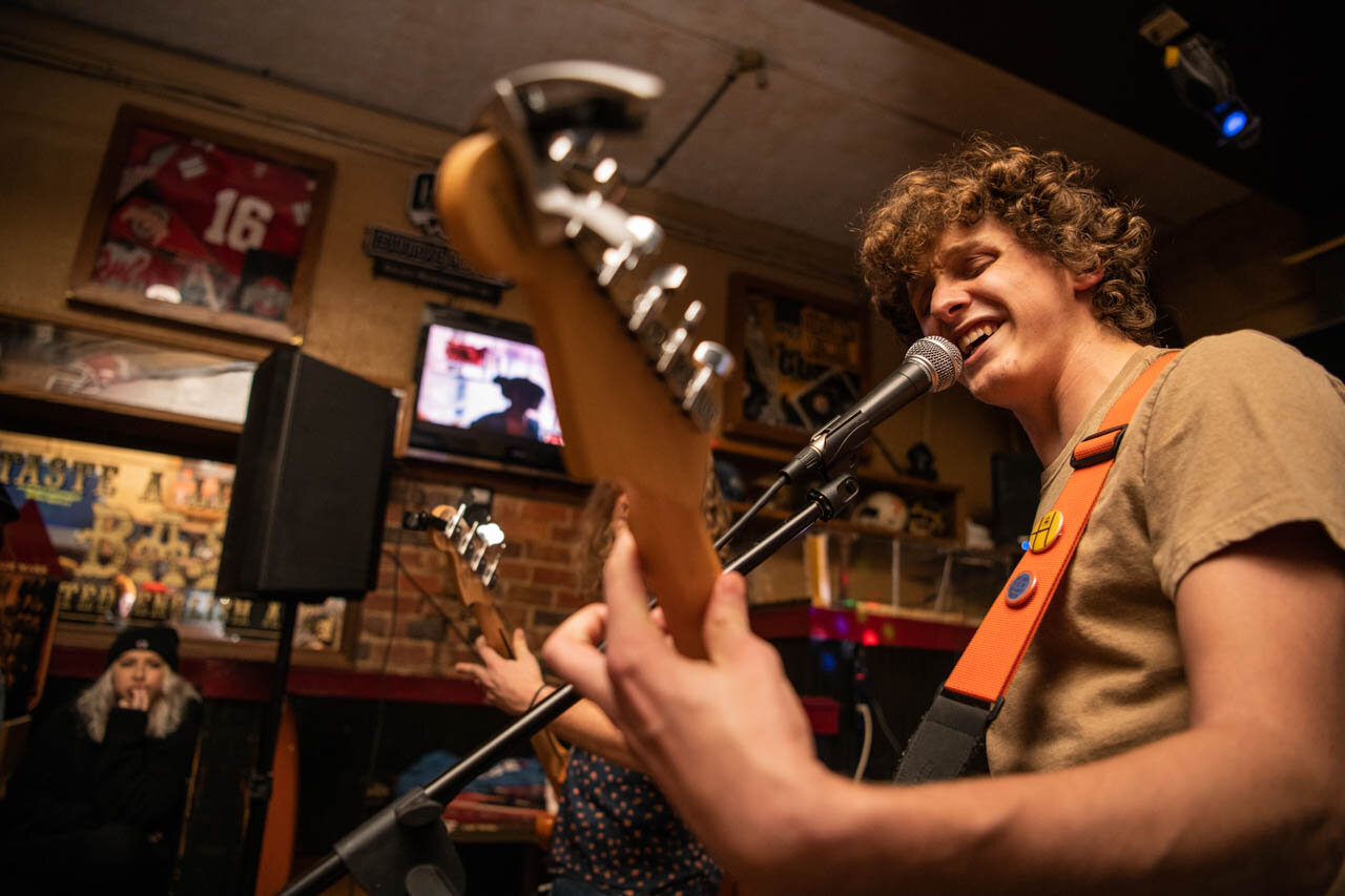   Carson Dunlap plays Guitar and Sings during The Gorilla Party set at Red Brick Tavern, in Athens, Ohio. 