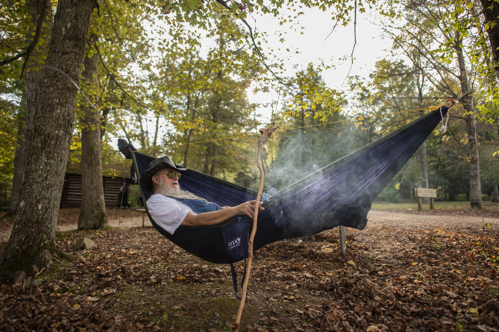  A man named “Russ” lays in his hammock outside of the Old Man’s Cave Visitors center in Hocking Hills, Ohio, on Saturday, September 28, 2019.  