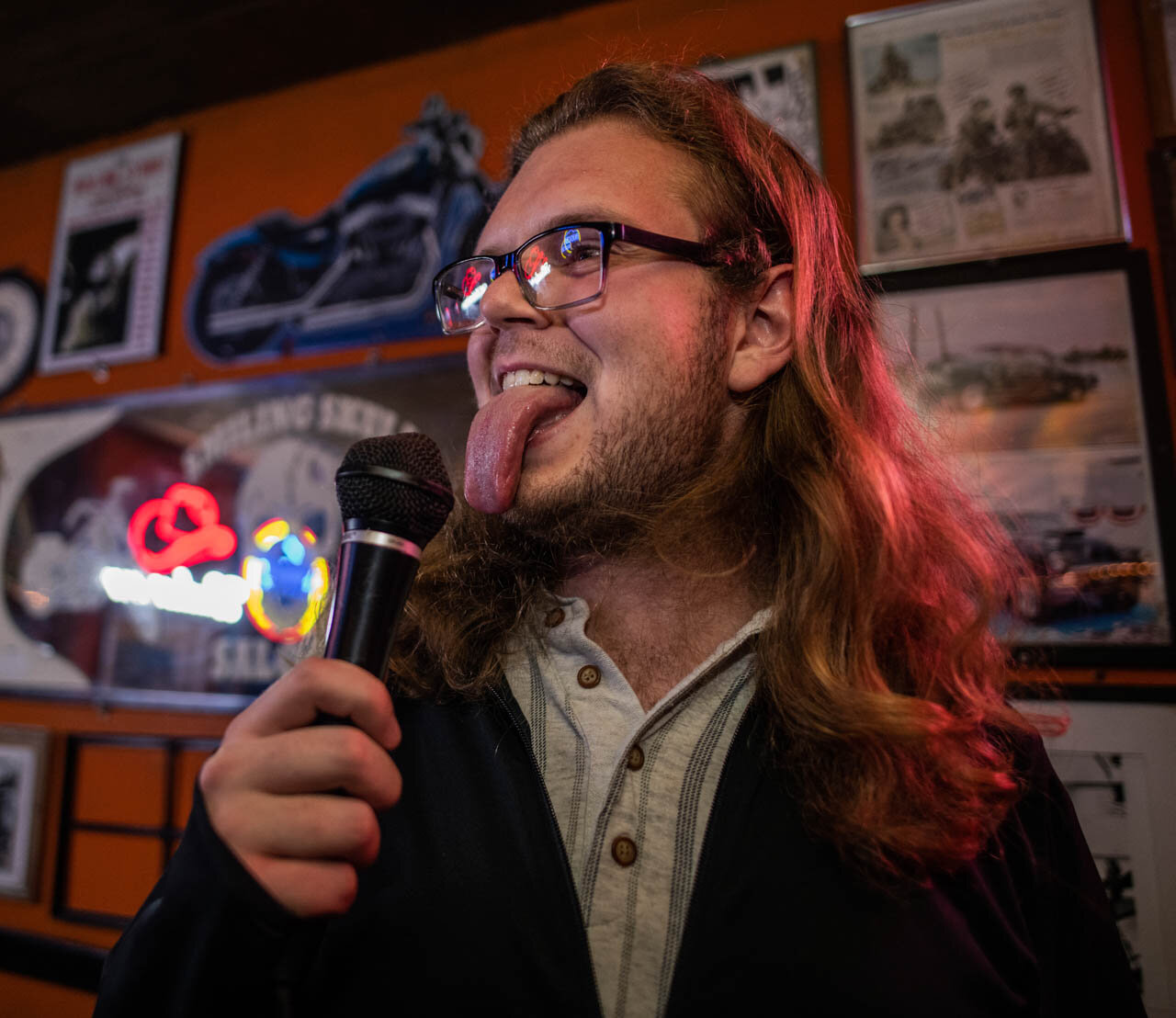  Preston Frick, Bass Player of Gorilla Party makes faces at his friends during soundcheck at The Smiling Skull, in Athens, Ohio, on Thursday, November 21, 2019. 