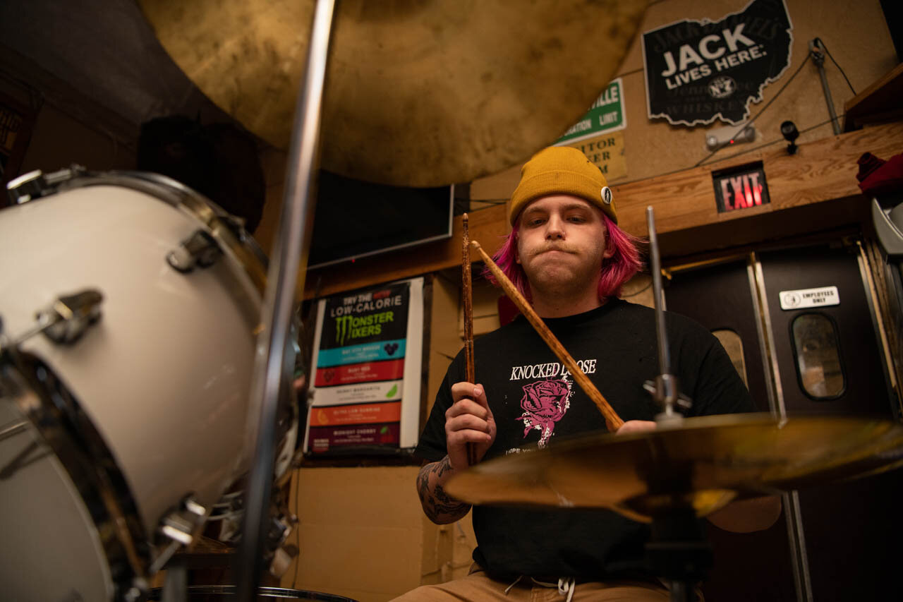  Tompkins prepares to play the Drums on Thursday, November 14, 2019 at Red brick Tavern in Athens, Ohio 