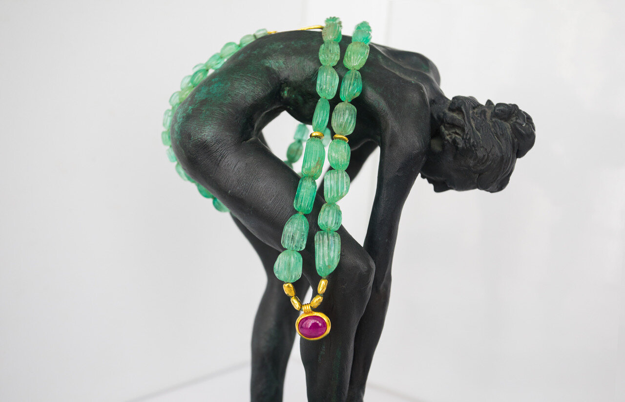 Melon carved emerald beads with 22k gold rice nuggets and cabochon ruby pendant