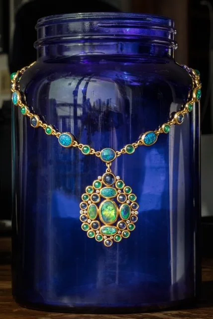 22k Gold black opal, sapphire, emeralds and diamond necklace