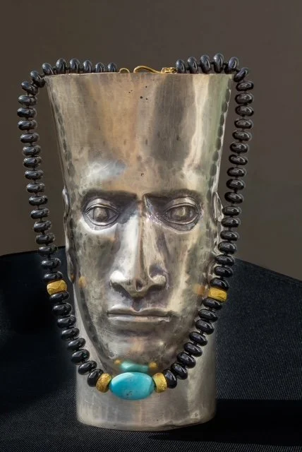 Onyx necklace with turquoise and gold