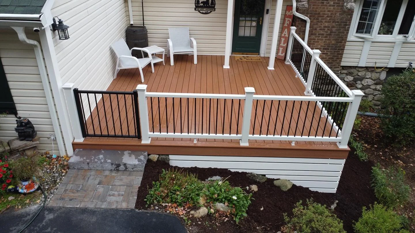 &bull;Timbertech Vintage Cypress decking/fascia. &bull;Trex Select classic railing with charcoal black balusters. 
&bull;Pressure treated frame fully G-taped for water protection. 
&bull;Kleer pvc post wraps for the entryway roof.
&bull;Kleer pvc ski